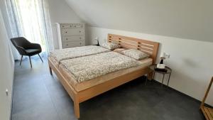 Postel nebo postele na pokoji v ubytování Apartmán U Karolíny