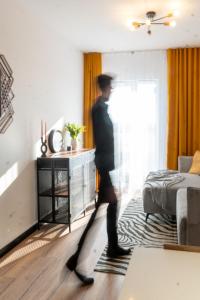Posteľ alebo postele v izbe v ubytovaní Sky apartment Wieża Jeżyce-widok, komfort, parking-APC APARTMENTS