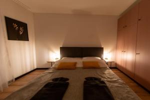 Posteľ alebo postele v izbe v ubytovaní Sky apartment Wieża Jeżyce-widok, komfort, parking-APC APARTMENTS