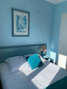 Postel nebo postele na pokoji v ubytování Hotel Le Bellevue