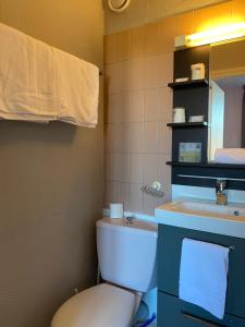 Koupelna v ubytování Hotel Le Bellevue