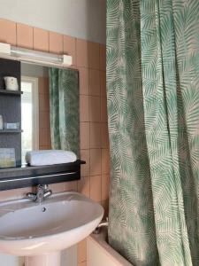 Koupelna v ubytování Hotel Le Bellevue