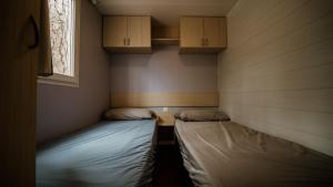 Postel nebo postele na pokoji v ubytování Camping Cobijo