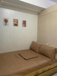 Postel nebo postele na pokoji v ubytování Estelle Ballentos staycation + 6 fotografií