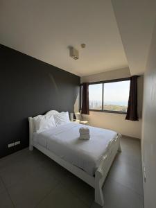 Llit o llits en una habitació de Unixx Pattaya High floor view 37 fotos més