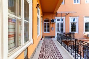 a hallway of a building with a balcony at BudaVibe Apartman w AC by NW in Budapest