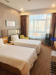 Кровать или кровати в номере Holiday Inn Express Beijing Dongzhimen by IHG