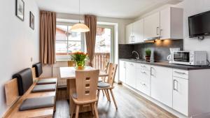 Kuchyň nebo kuchyňský kout v ubytování Appartement Treffpunkt