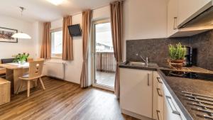 Kuchyň nebo kuchyňský kout v ubytování Appartement Treffpunkt