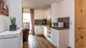 Kuchyň nebo kuchyňský kout v ubytování Appartement Treffpunkt