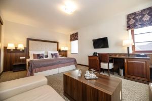 Posteľ alebo postele v izbe v ubytovaní Hotel Sladovna