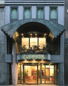 a building with an entrance to a restaurant at Hotel Capitol Milano in Milan