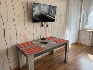 TV a/nebo společenská místnost v ubytování Gesamte Unterkunft WLAN & Parkplatz - Backnang