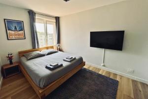 Posteľ alebo postele v izbe v ubytovaní Appartement - Concarneau