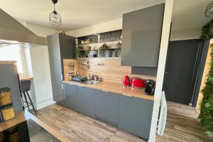 Kuchyňa alebo kuchynka v ubytovaní Appartement - Concarneau