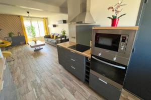 Kuchyňa alebo kuchynka v ubytovaní Appartement - Concarneau