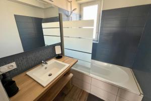 Kúpeľňa v ubytovaní Appartement - Concarneau