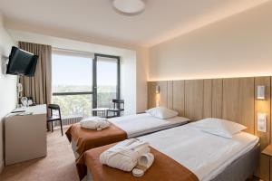 Postel nebo postele na pokoji v ubytování Hotel Jurmala Spa