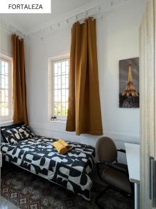 Postel nebo postele na pokoji v ubytování CoLiving Villa Brasil