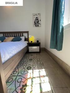 Postel nebo postele na pokoji v ubytování CoLiving Villa Brasil