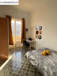 Postel nebo postele na pokoji v ubytování CoLiving Villa Brasil