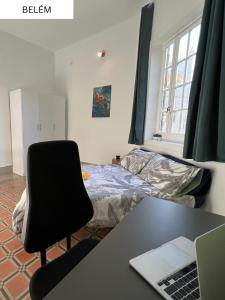 Postel nebo postele na pokoji v ubytování CoLiving Villa Brasil