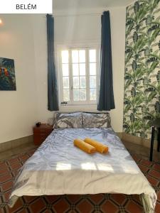 Postel nebo postele na pokoji v ubytování CoLiving Villa Brasil