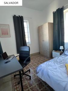 Postel nebo postele na pokoji v ubytování CoLiving Villa Brasil
