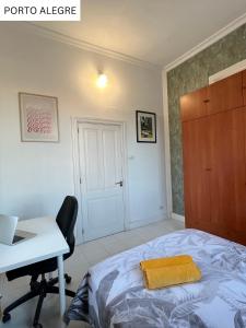Postel nebo postele na pokoji v ubytování CoLiving Villa Brasil