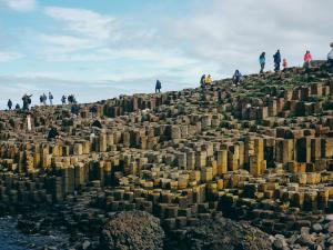 a group of people standing on top of a mountain at Portrush Adelphi in Portrush