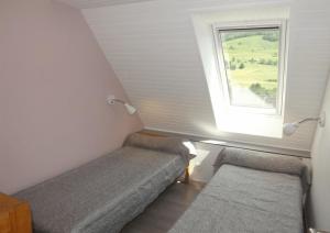 Katil atau katil-katil dalam bilik di Gite 5 Vacances en Auvergne Gîte au Puy Mary avec Activités de Plein Air