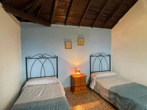 Postel nebo postele na pokoji v ubytování Mara Jos rural house