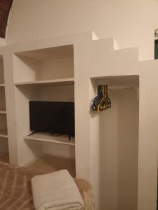 TV a/nebo společenská místnost v ubytování Chillax Dahab