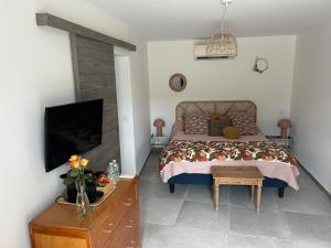 Postel nebo postele na pokoji v ubytování Mon Chemin Privé