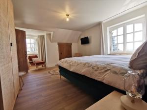 Postel nebo postele na pokoji v ubytování B&B Lili's Tuin
