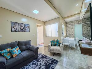 Posezení v ubytování Encanto, conforto e praticidade em um só lugar