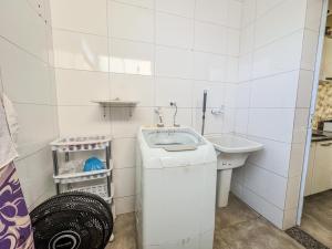 Koupelna v ubytování Encanto, conforto e praticidade em um só lugar