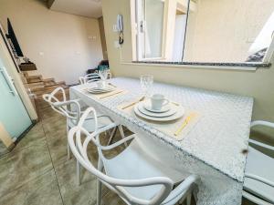 Posezení v ubytování Encanto, conforto e praticidade em um só lugar