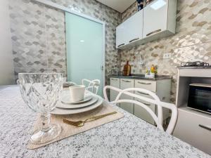 Kuchyň nebo kuchyňský kout v ubytování Encanto, conforto e praticidade em um só lugar