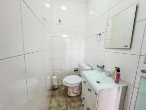 Koupelna v ubytování Encanto, conforto e praticidade em um só lugar
