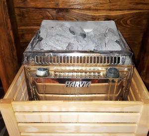 an old stove sitting inside of a wooden box at Villa di Lago Albano - Castel Gandolfo in Albano Laziale