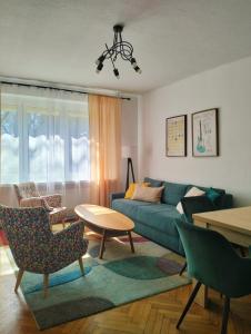 Khu vực ghế ngồi tại Apartament Brzozowa