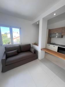 A kitchen or kitchenette at Cormorani - Appartamento 13
