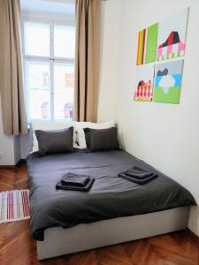 Posteľ alebo postele v izbe v ubytovaní Apartment Havlickova