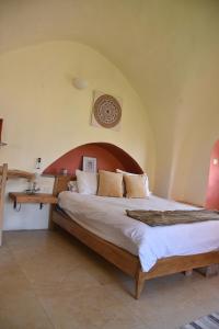 Letto o letti in una camera di Artists' Colony Inn Zefat