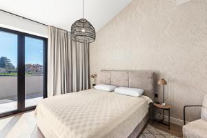 En eller flere senge i et værelse på Villa Tena + 20 billeder