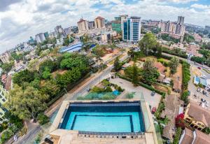 an overhead view of a swimming pool in a city at The Lofts on Wood Avenue in Nairobi