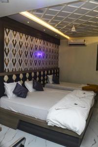 Hotel Grace Lodging & Boarding客房内的一张或多张床位