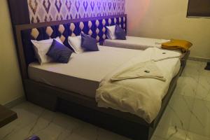 Hotel Grace Lodging & Boarding客房内的一张或多张床位