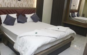 Hotel Grace Lodging & Boarding客房内的一张或多张床位